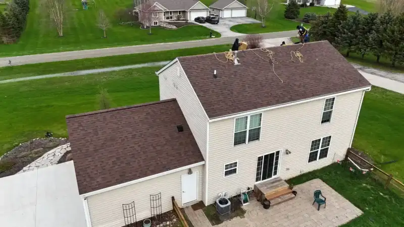 Aerial view of newly installed architectural shingle roof on a Wisconsin two-story home